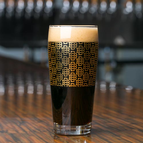 Little Shady dark lager beer poured in a glass