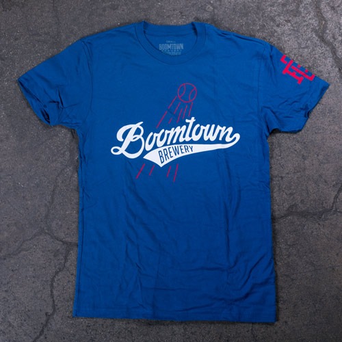 Blue shirt with baseball logo printed on front