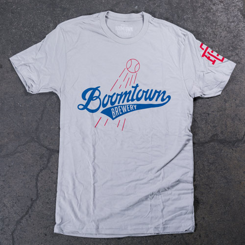 White shirt with baseball logo printed on front