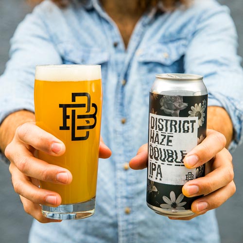 District Haze DIPA beer in glass and can